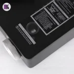 تصویری از قسمت جایگذاری کپسول اجاق گاز سفری سه‌ شعله یانچوان رنگ مشکی بادگیر دار